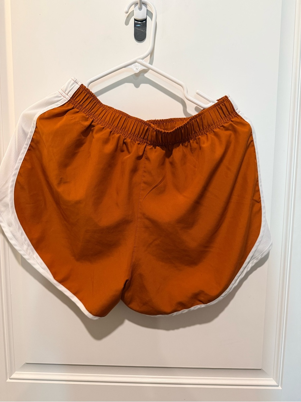 Nike Women’s Burnt Orange Athletic Shorts with White Trim - Picture 2 of 6